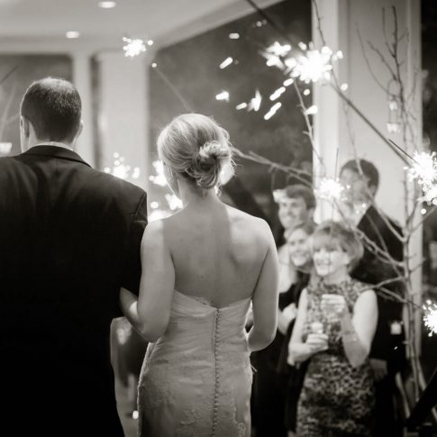 The bride and groom exit the Piedmont Club, their reception location.