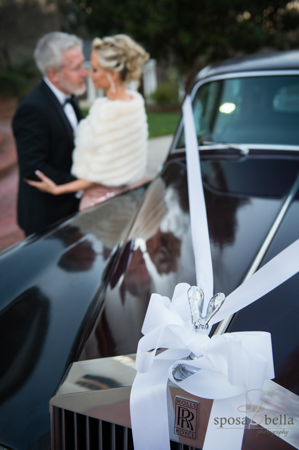 Love the ribbon and the reflection of the happy couple on the shiny Rolls Royce!