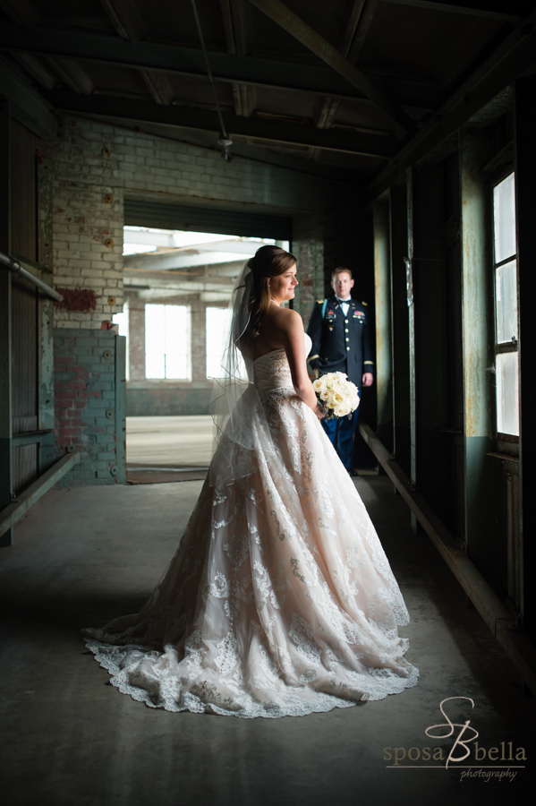 I just love the dramatic light on the bride and groom in this hallway.