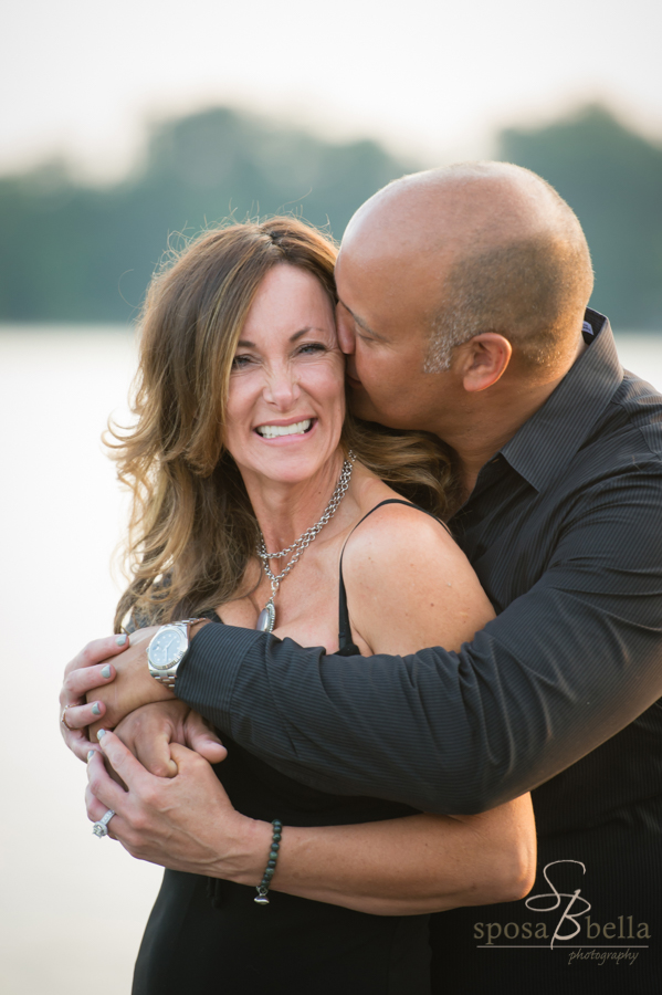 Snuggly couple with Lake Keowee in the background.