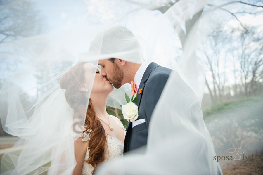 Veils are my favorite part of a bride's attire. And it can be used in so many creative ways for photos. It was a windy day and you can see it in the way Stephanie's view is billowing around!