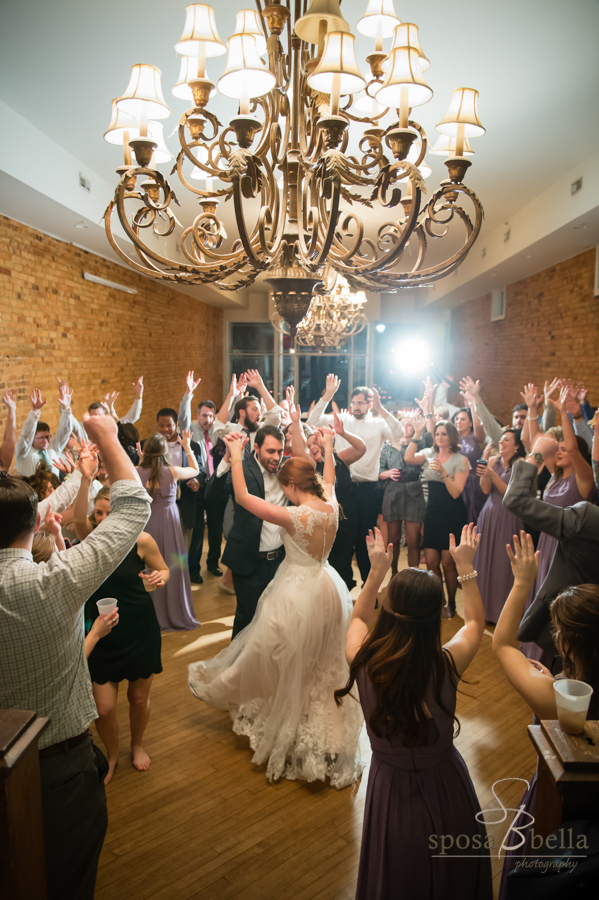 At the end of the reception, Blake from Jumping Jukebox had the guests circle around the bride and groom for one last dance. I just love this moment with everyone's hands in the air in celebration.