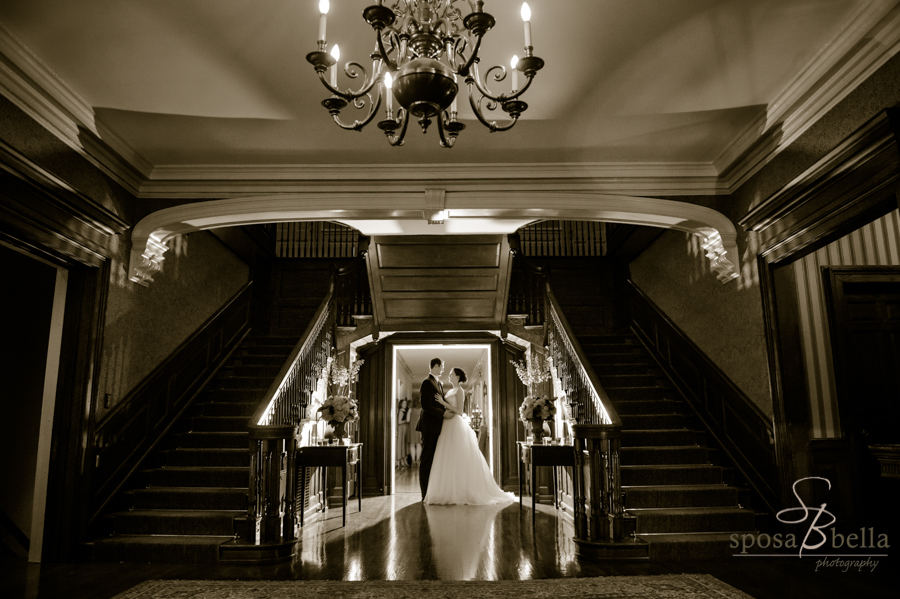 A bride and groom in the Poinsett Club staircase. Greenville, SC 2017