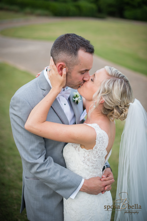 Bride and Groom kiss at their Reserve at Lake Keowee wedding.