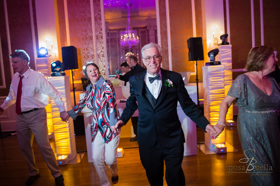 Father of the groom dancing at the reception.