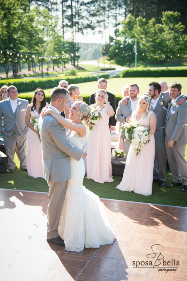 Happy newlyweds dancing at their Reserve at Lake Keowee reception.