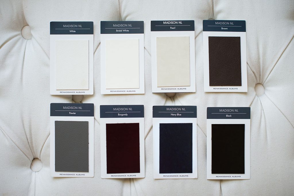Swatches of leather and silk colors for wedding album covers.