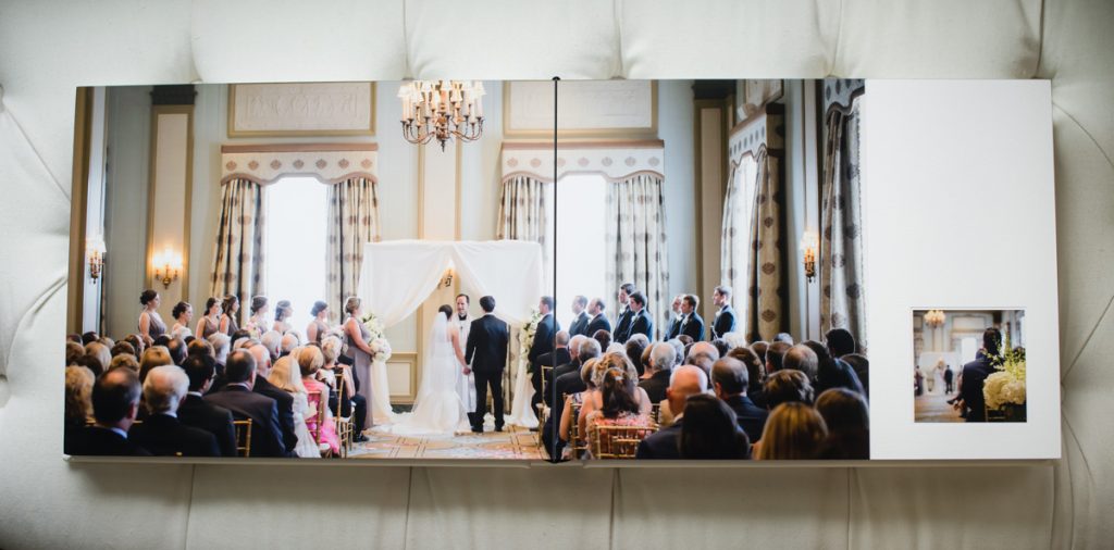 Over-all photo of a ceremony in a wedding album.