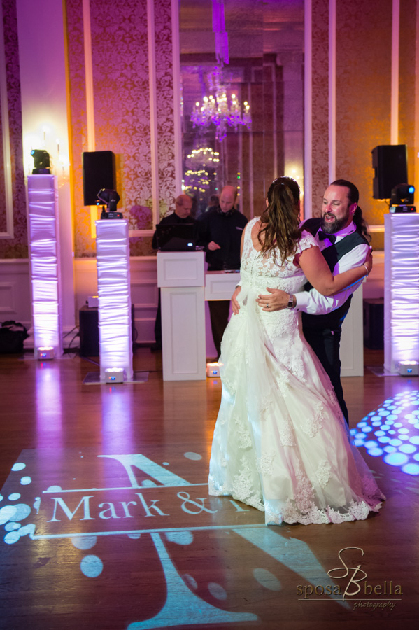 Bride and groom dancing at their wedding reception.