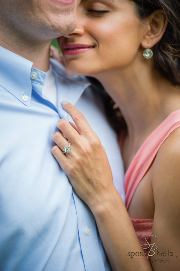 Seema snuggles up to her fiancé and the photographer captures her beautiful engagement ring. 