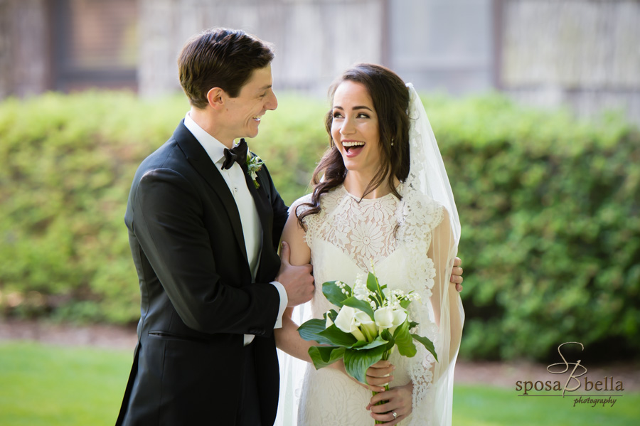 Bride reacts with happiness to seeing her groom during their first look. 