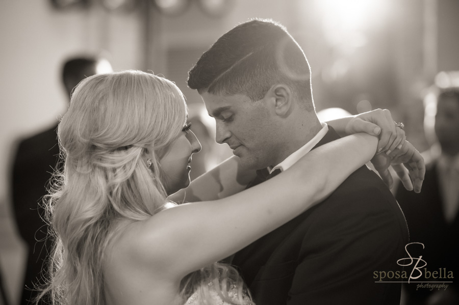 Lovingly staring at her husband during the couple's first dance.