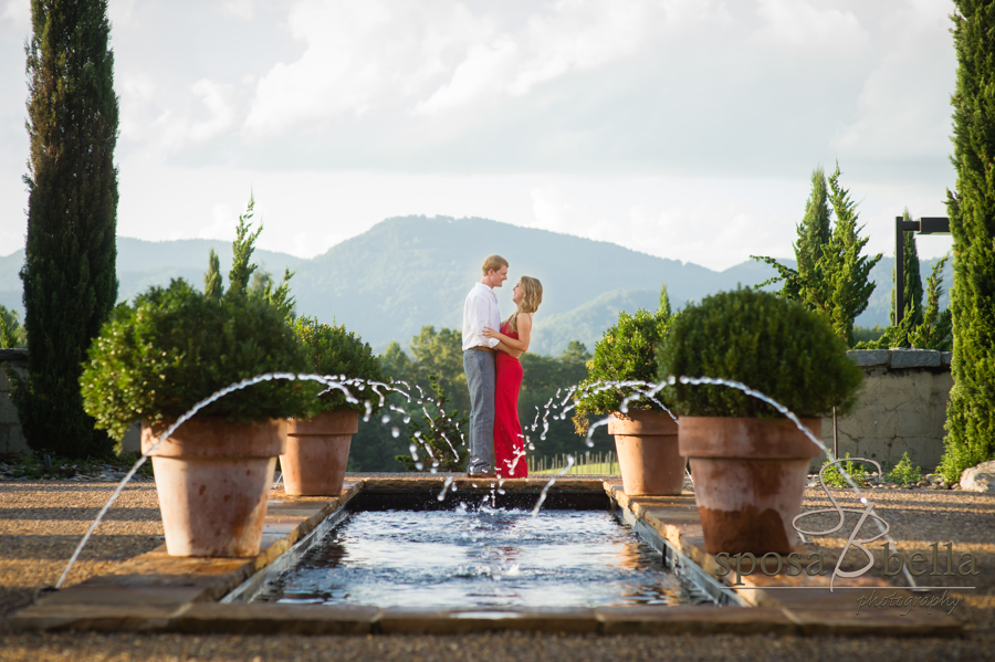 Mitchell and Haley embrace with the Blue Ridge mountains in the background. 