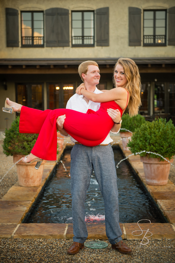 The couple practices their bridal carry. 