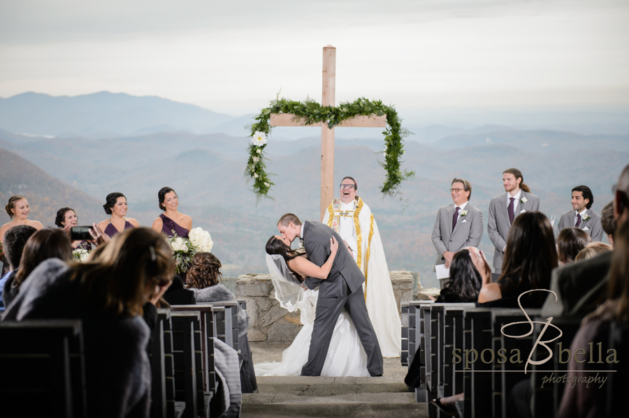 John kisses his new bride at the end of the ceremony. 