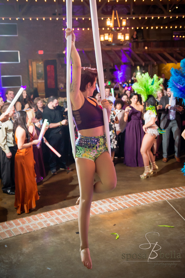 The aerialist performer and the Brazilian fusion dancers were a complete surprise to the guests.