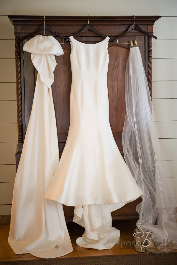 Leland's dress and veil hang from the beautiful wooden dresser at Old Edward's Inn in Highlands.