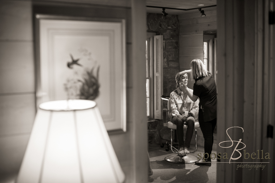 Leland gets her makeup and hair done before the ceremony. 