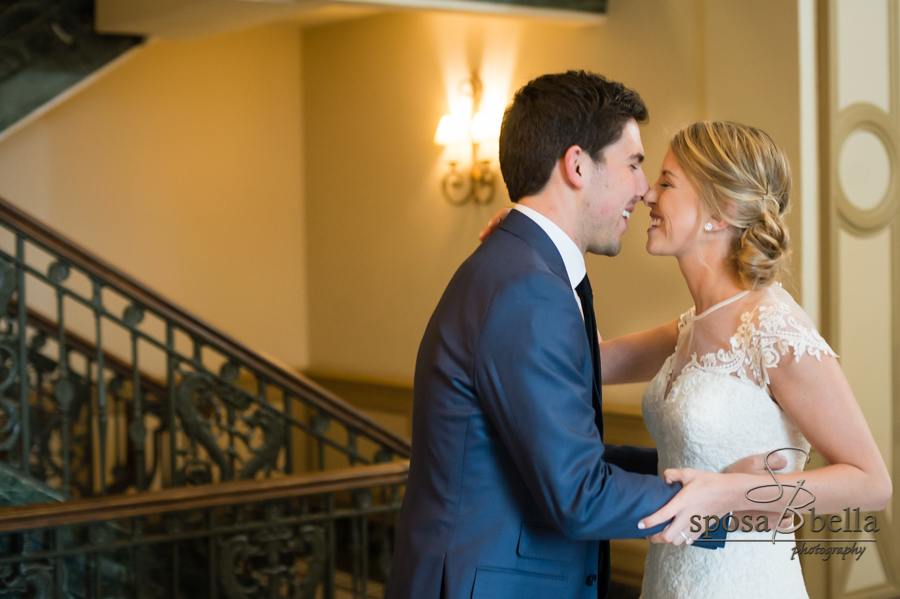 Bride and groom embrace.