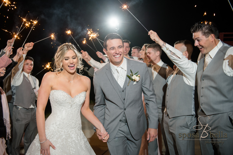 The happy couple's grand exit to sparklers.